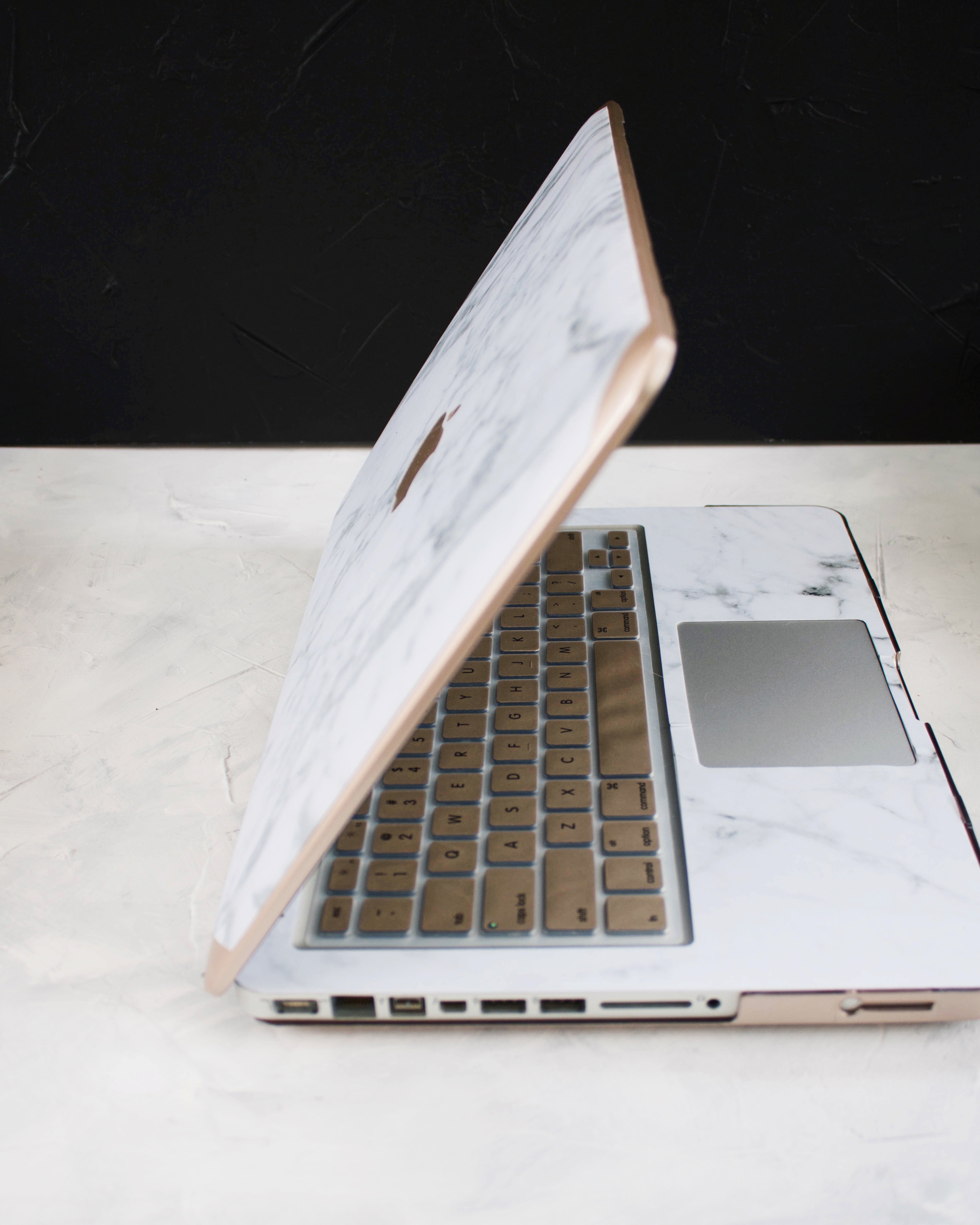Gold and Logo White Marble MacBook Case
